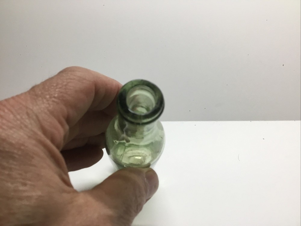 Antique Push Up Base Sample Size Wine Bottle.