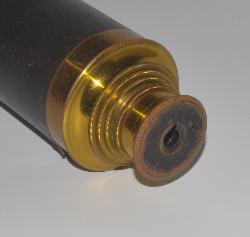 A large 4 draw telescope by E B Meyrowitz.