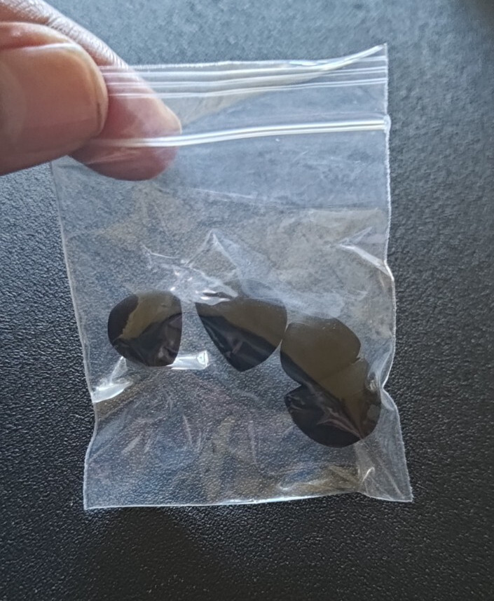 Silver loop shaped noise reducing sleep aid earplugs w/extra buds