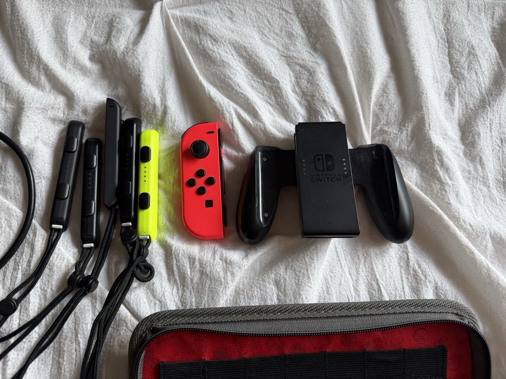 Nintendo Switch Bundle with Extra Joy-Con, Case, Dock, Cables, & Straps