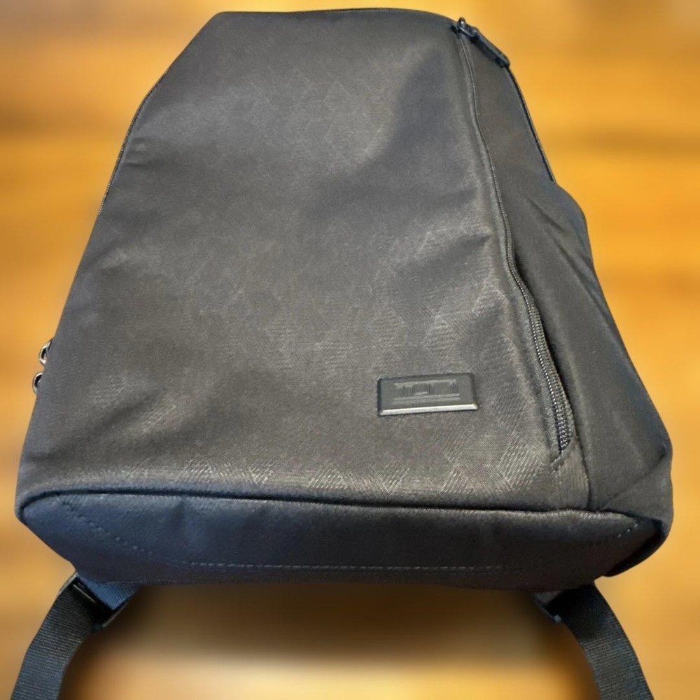 TUMI geometric pattern black backpack