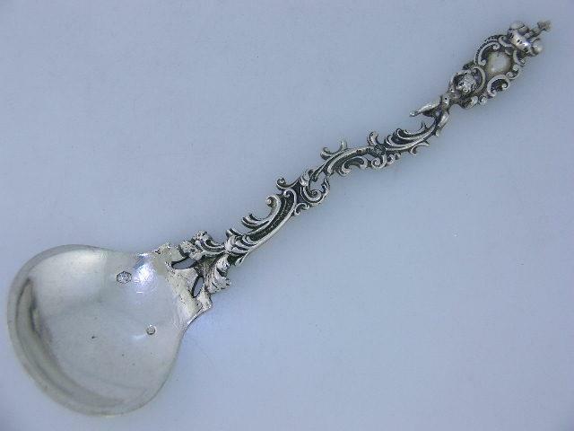 Old Dutch .833 Silver Figural Serving Spoon cherub / putti & scrolls c1895