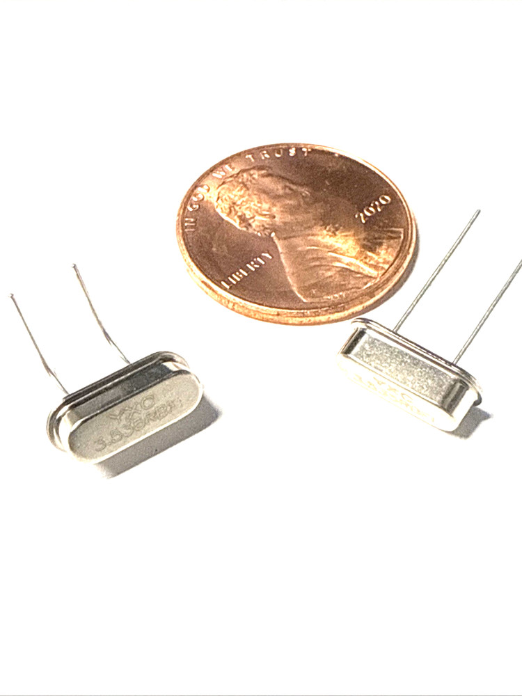 2 pcs 7.040 MHz Crystal. HC49/S