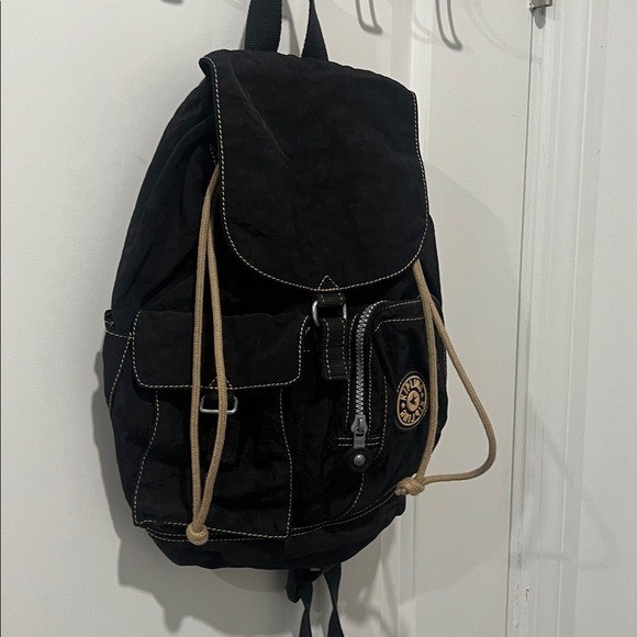 2003 Vintage Kipling Small Black Backpack with Tan Drawstrings