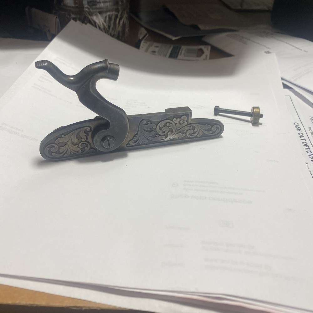 Investar,s engraved lock with brass bushing and bolt.