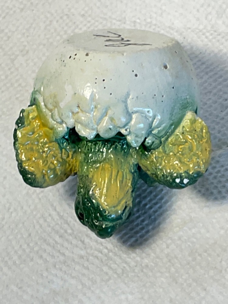 Hatching baby turtle figurine aged wear