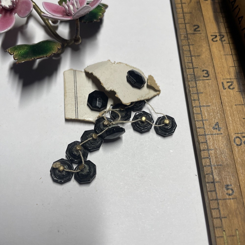 A Dozen Antique Black Glass Buttons