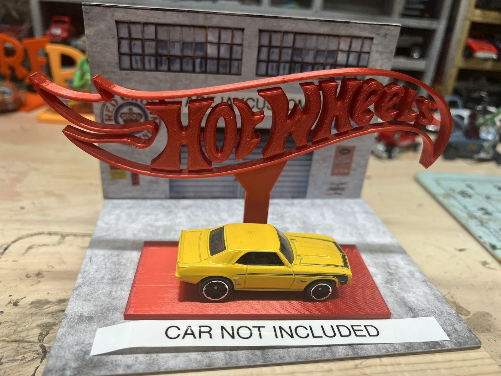 red hotwheels stand