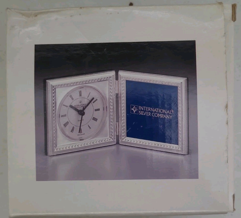 Silver plated double frame clock. International Silver Company. Open Box.