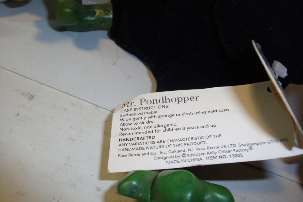 Mr. And Mrs.Pondhopper figures with tags