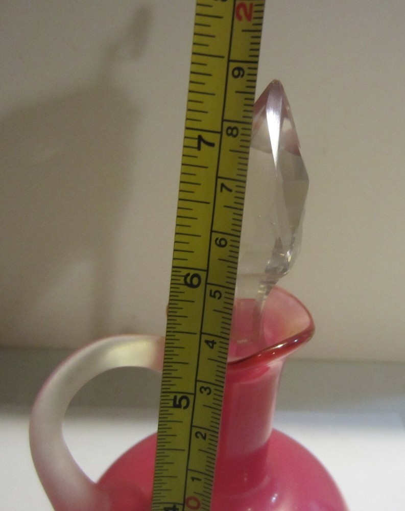Frosted cranberry color perfume bottle