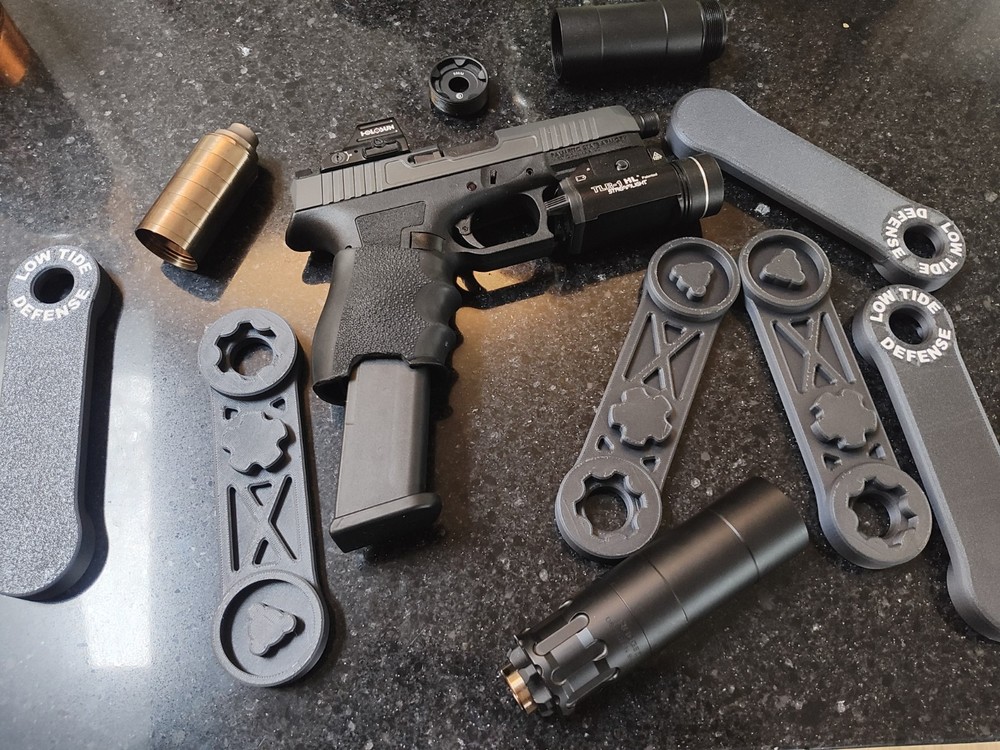 Rugged obsidian 9/45 suppressor tool.