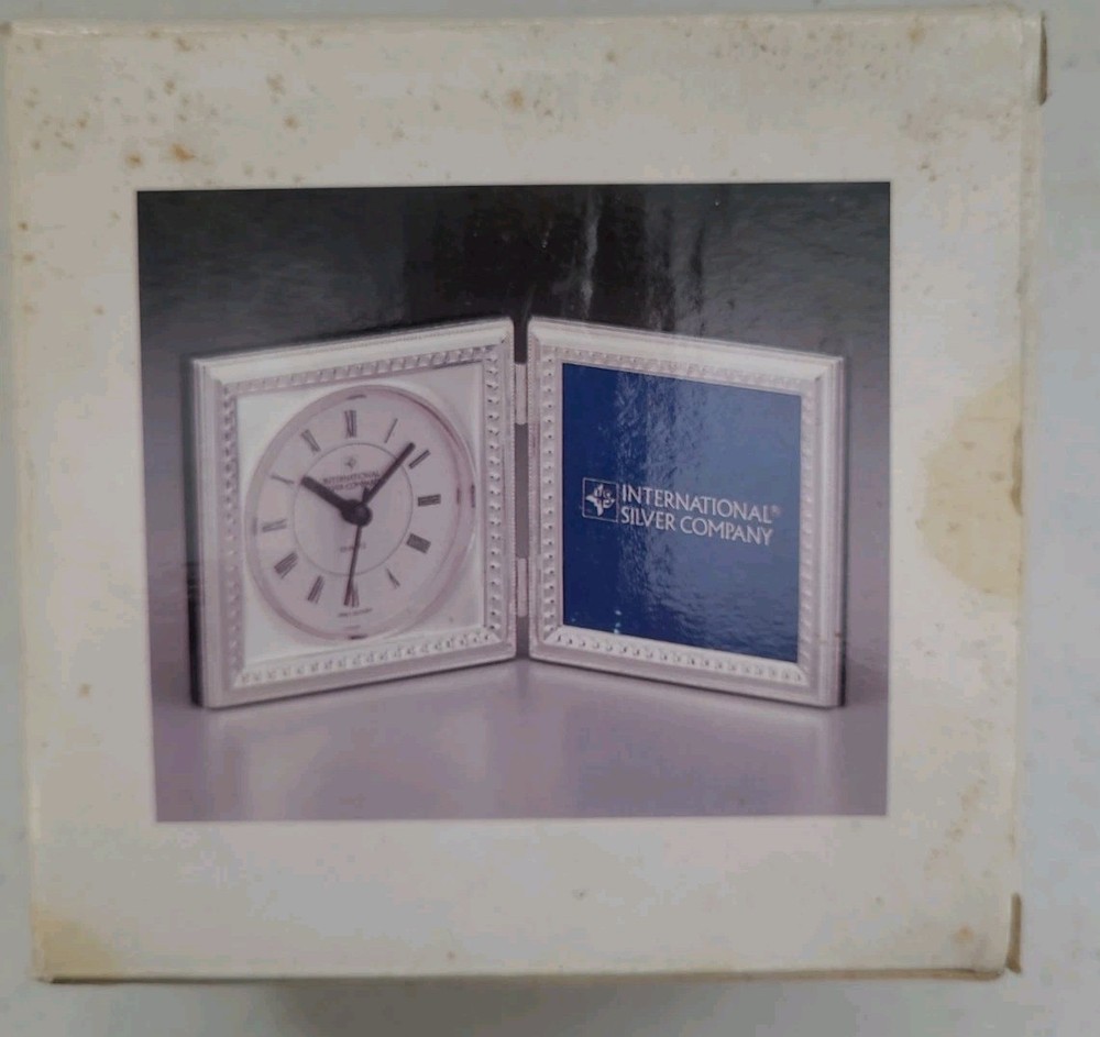 Silver plated double frame clock. International Silver Company. Open Box.