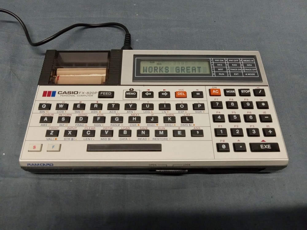 CASIO FX-820P Personal Computer With Charger Case and Manuals FULLY FUNCTIONAL!