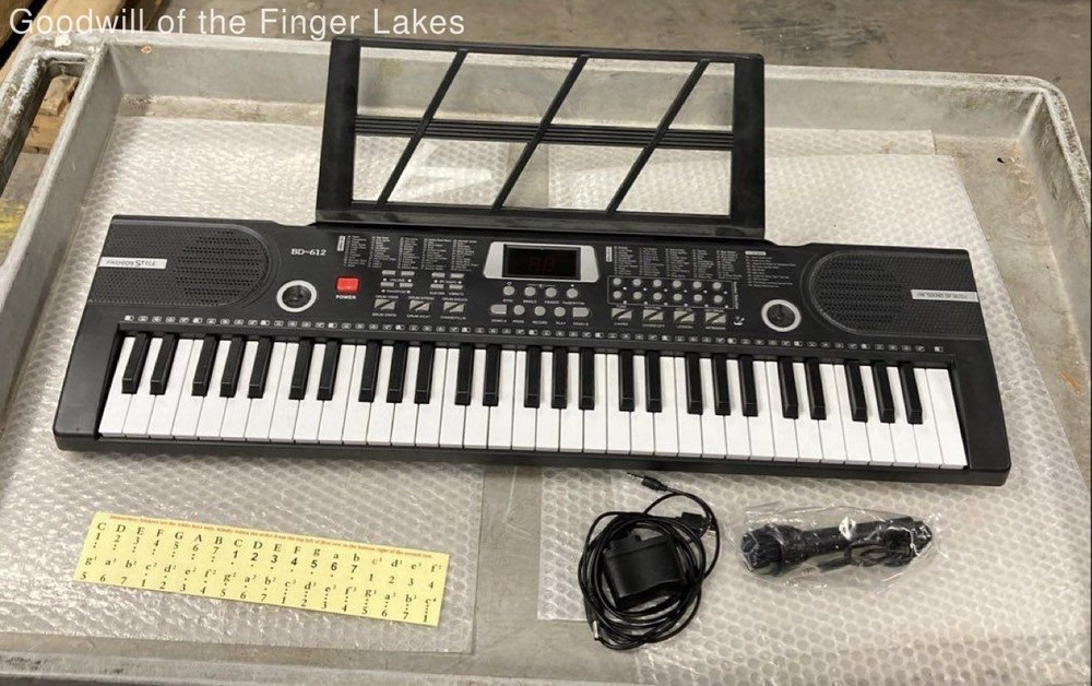 Unbranded 61Keys Electronic Keyboard Powers ON