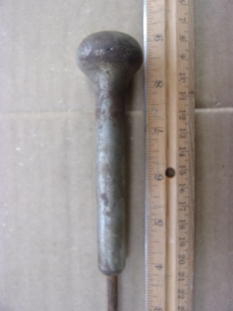 vintage spring loaded cast awl