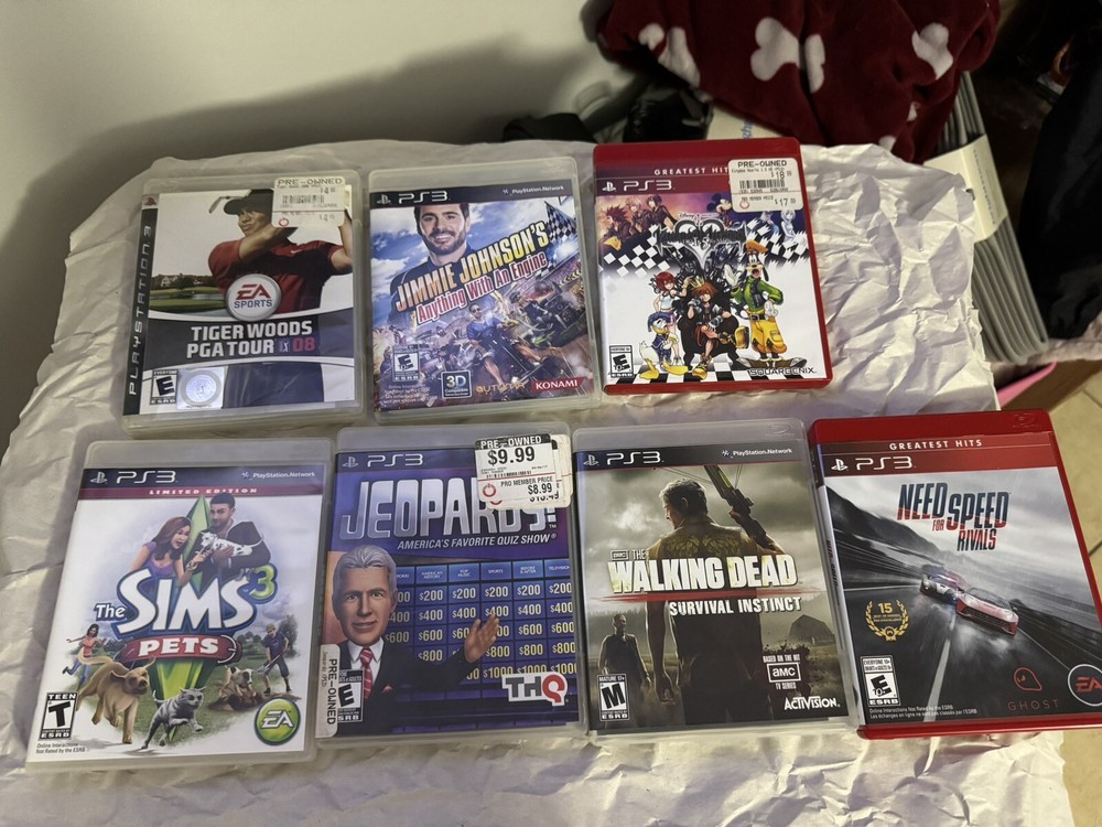 ps3 games bundle (console, 2 Wireless Controllers, and 7 Games. Gently Used.
