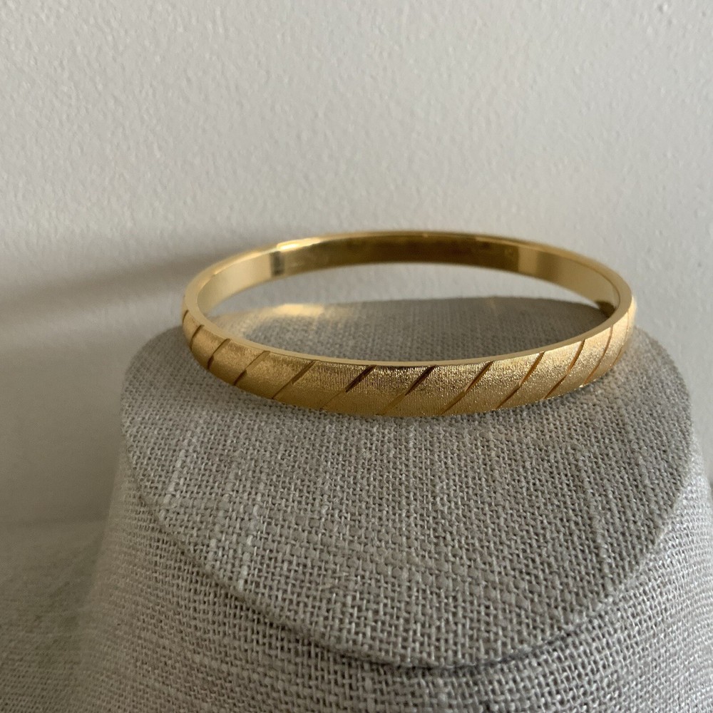 Classic MONET medium sized etched textured diamond dust stripped bangle in gold