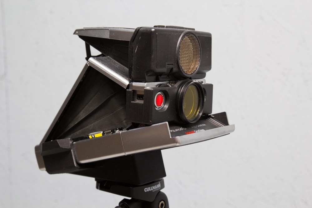 Tripod mount for Polaroid SX-70 Instant camera