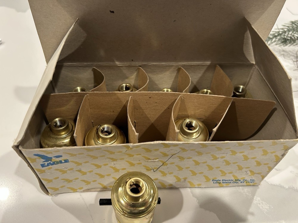 9 NOS 1/8” CAP EAGLE BRASS DIPPED SOCKETS.