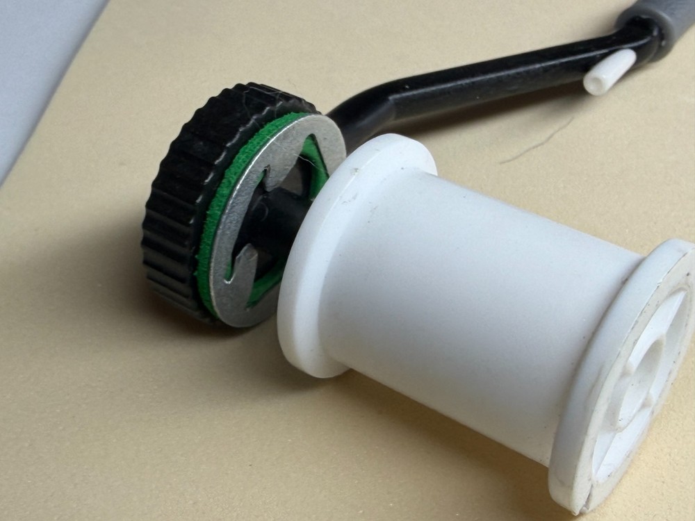 fly tying bobbin ceramic with dual clutch disc drag.