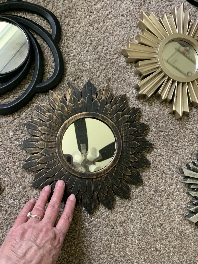 Nine Plastic starburst and other designs mirrors