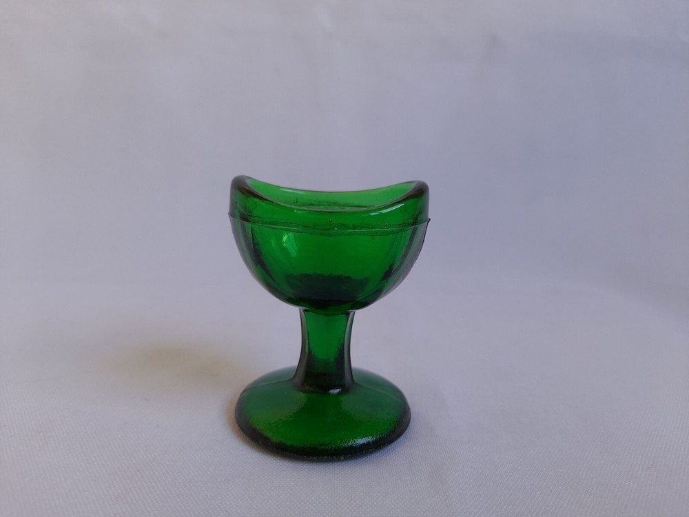 Antique green eyewash glass