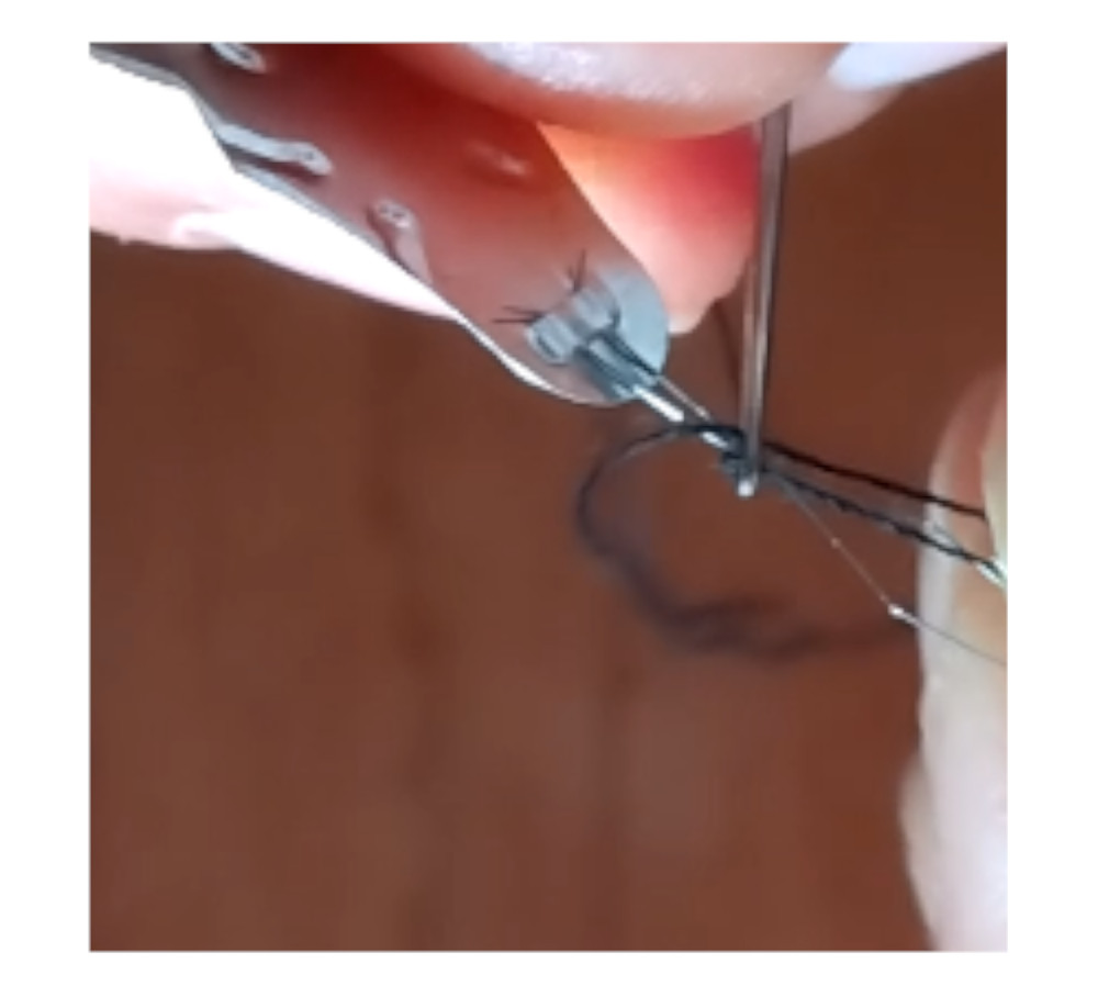 Two Flimsy Needle Threaders. Helps you thread a needle.