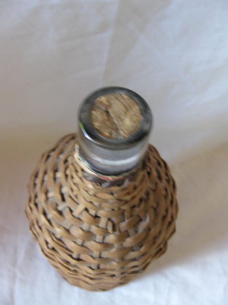 BOTTLE WITH HANDWOVEN WICKER WRAP. DEMIJOHN, 10"