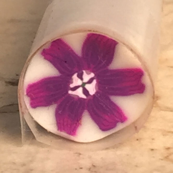 Purple flower in flower polymer clay cane