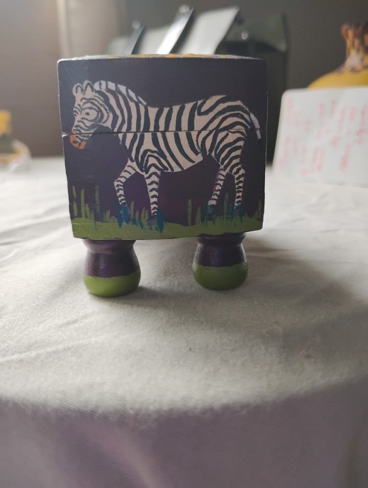 small painted box with tiger, elephant, zebra, lion, monkey