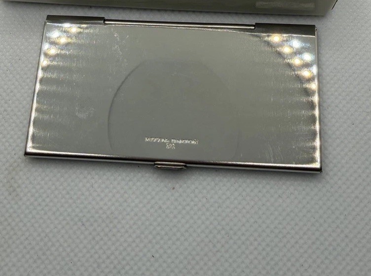 Reed and Barton Stamp Case.