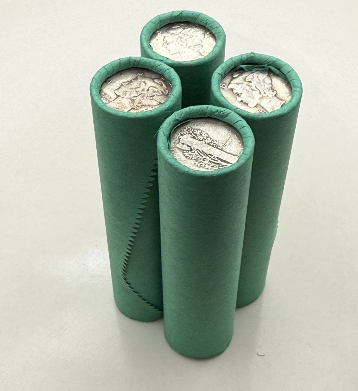 SILVER MERCURY DIME showing on old vintage unsearched green wheat penny roll us