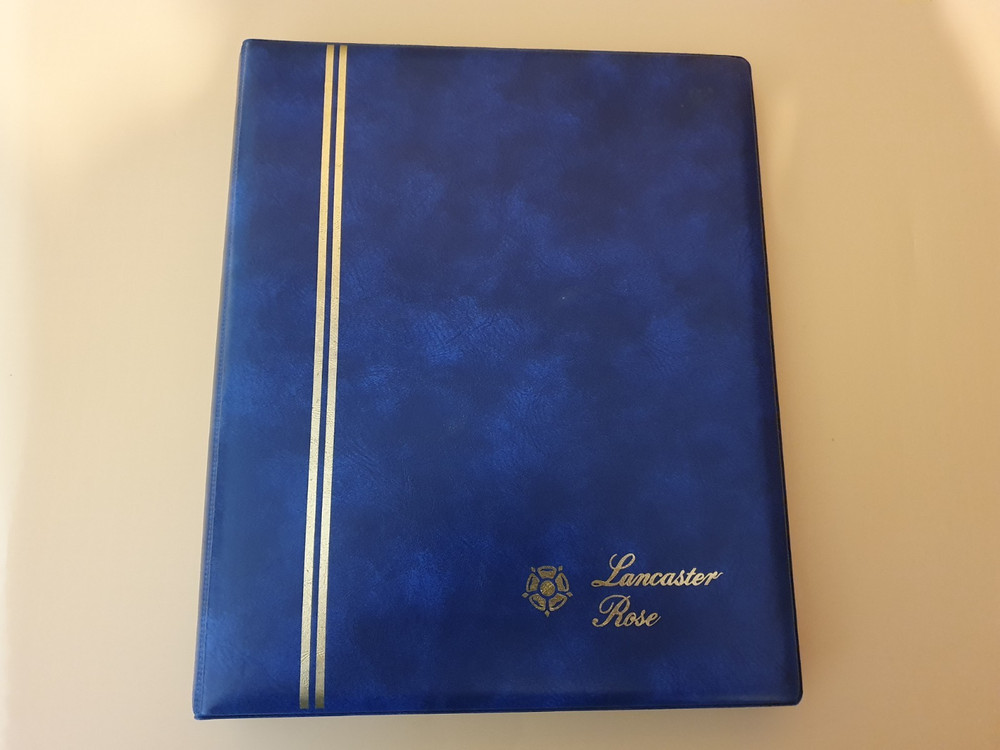 LANCASTER ROSE STAMP ALBUM CONTAINING APPROX 50 MINT GB COMMEMORATIVE SETS #3240