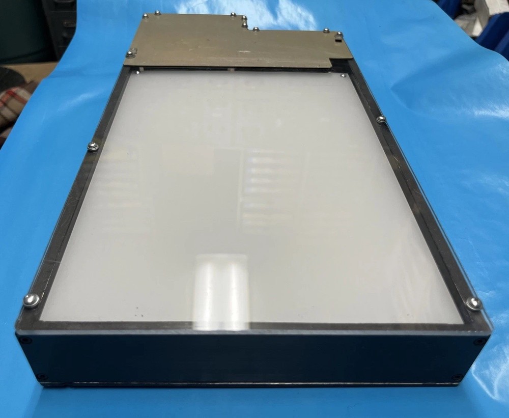 Electronic Chips Inside Testing Light Box For Perhaps Plastic Bottles Integrity.