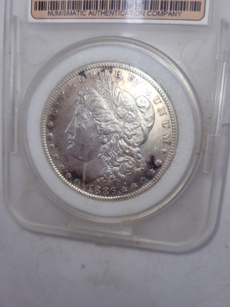 1886 Morgan Silver Dollar – Mint State – 90% Silver – Encapsulated
