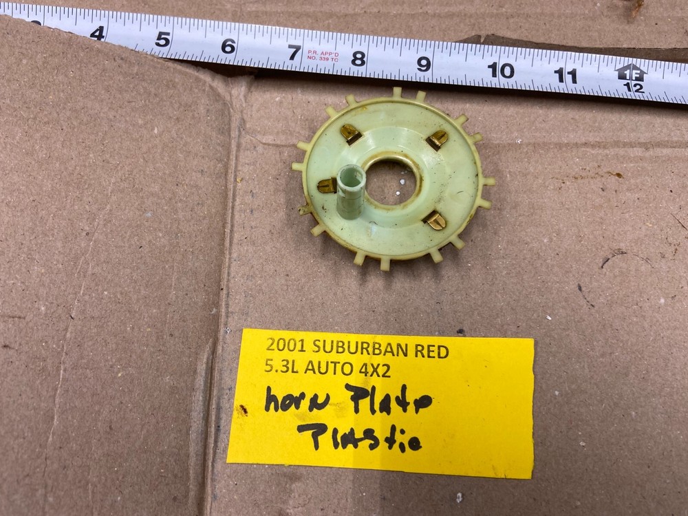2000-2002 SuBURBAN 1500  HORN PLATE PLASTIC