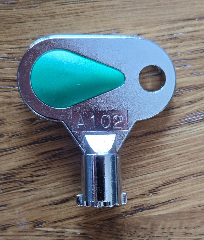 Pachislo slot machine door key with the code A102