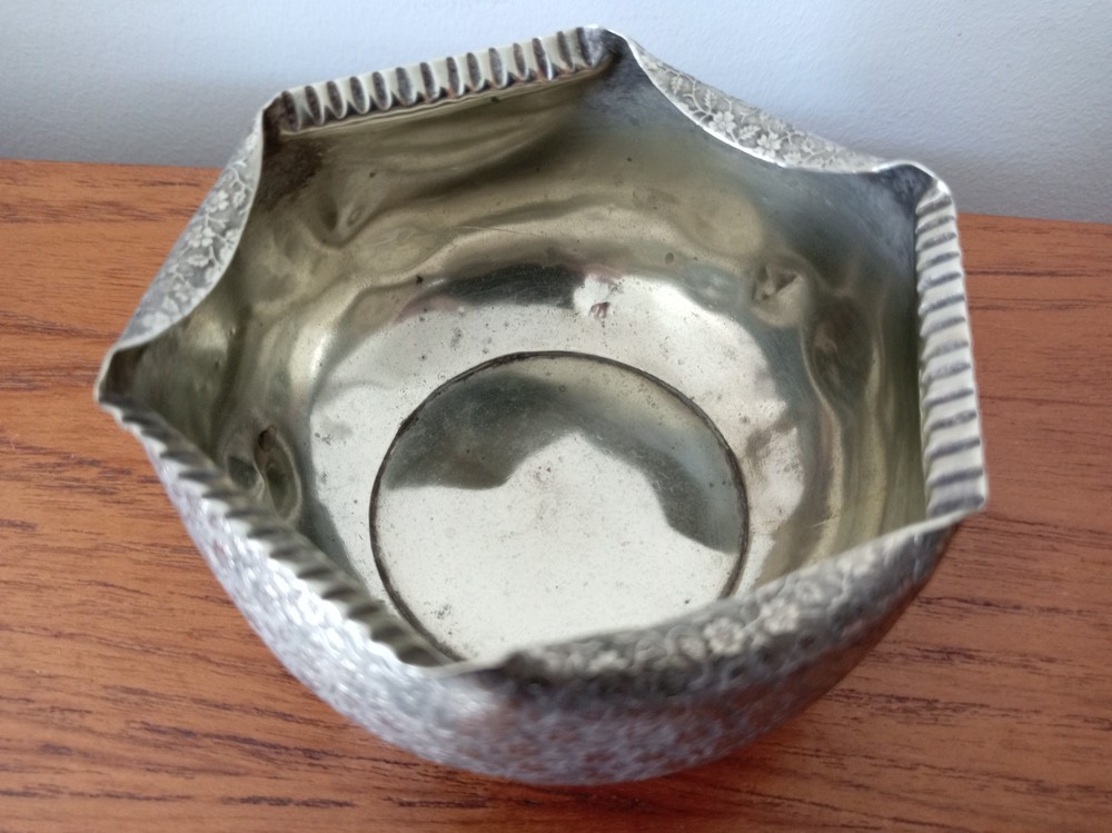 Silver plated very ornate rose bowl.