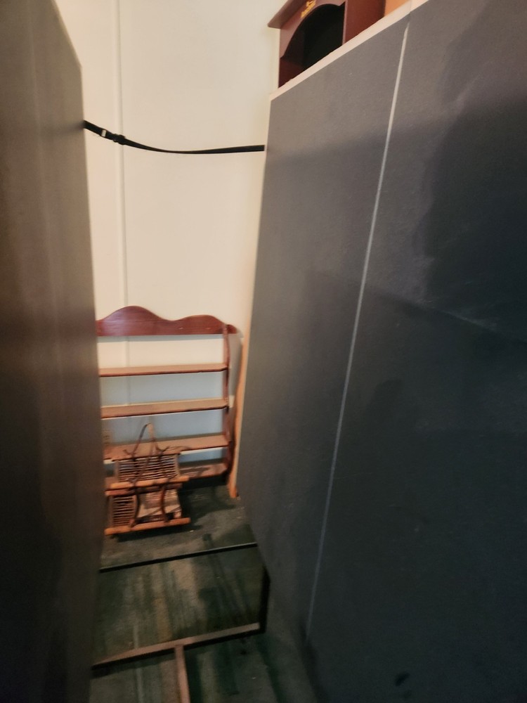 ping pong table and dart cabinet