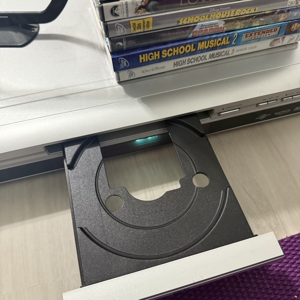 Koss DVD / CD / MP3 Player KD365 with Sealed DVD Bundle