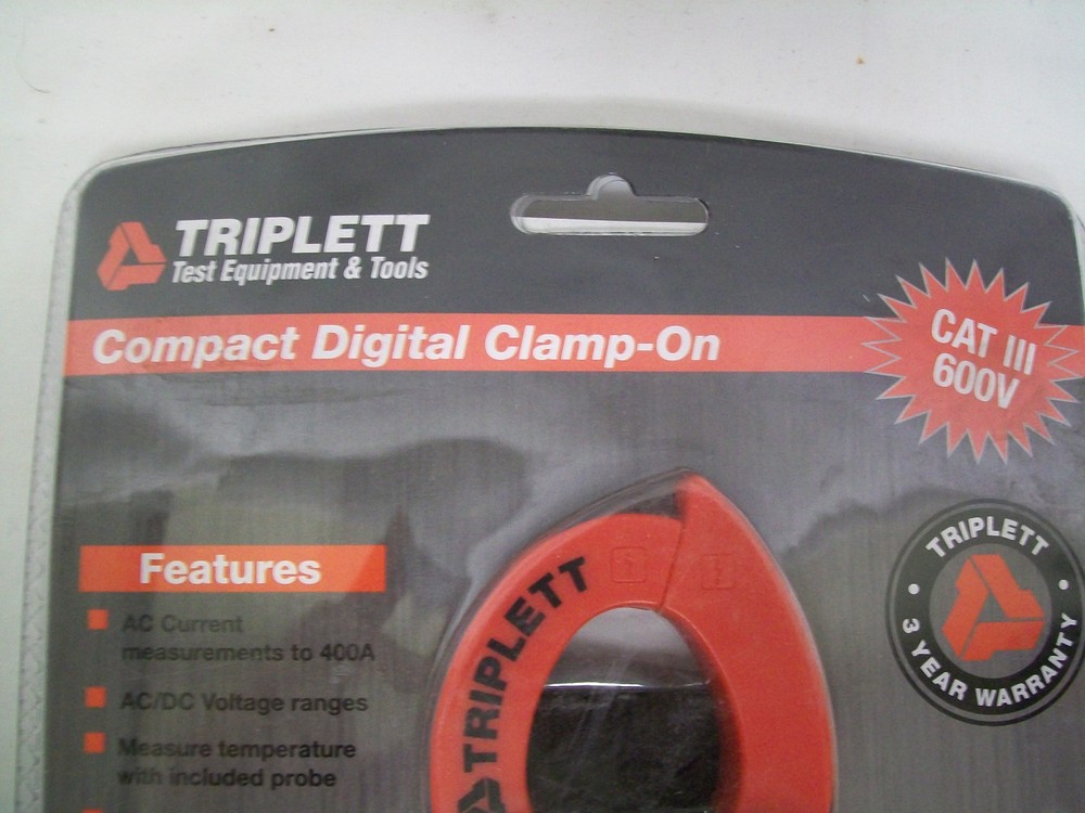 Triplett Model 9305 Compact Digital Clamp On Meter. New in Package