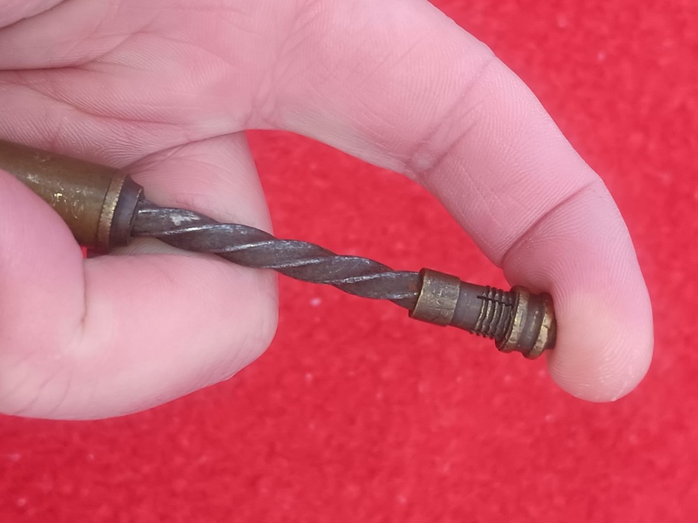Antique brass push drill spiral drill, spring inside Brass handle Unmarked Maker