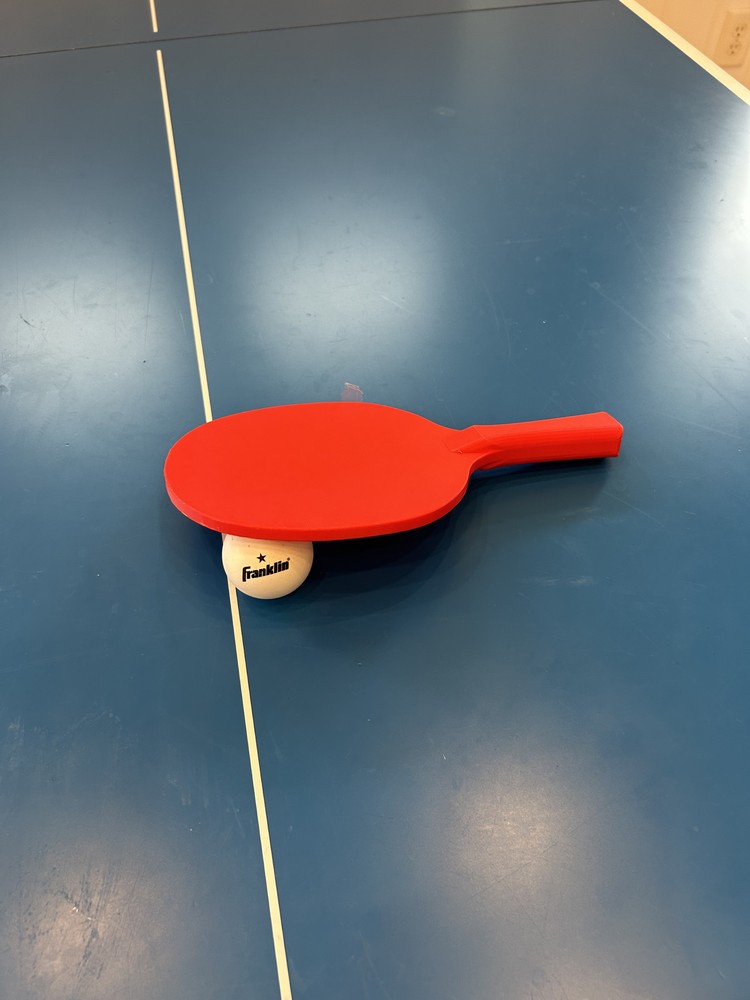 Red 3D printed ping pong paddle