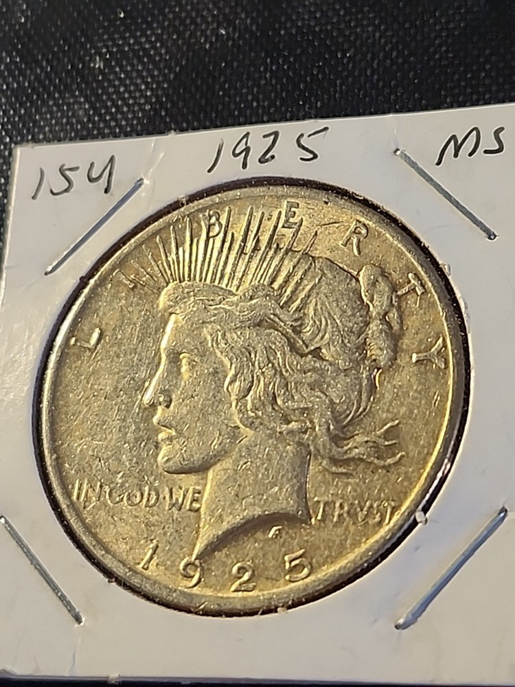 1925 Silver Peace Dollar In Brilliant Uncirculated Condition