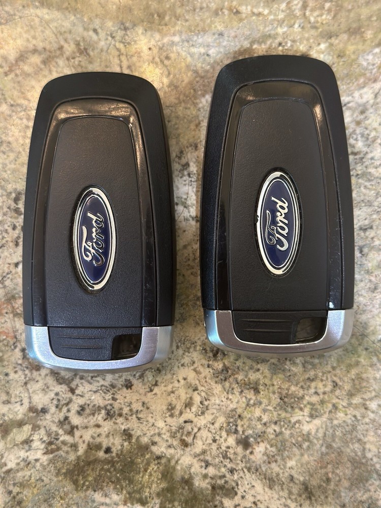 Two Ford fusion Keyless Entry Remote Key Fob