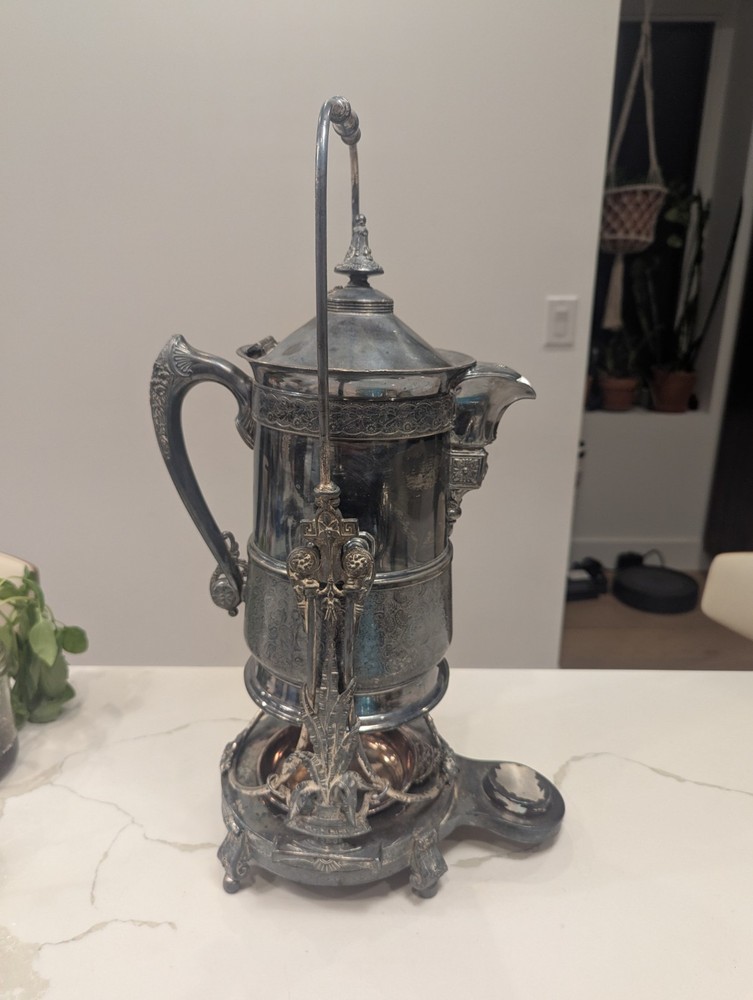 James W Tufts Silver Plated Tilting Water Pitcher