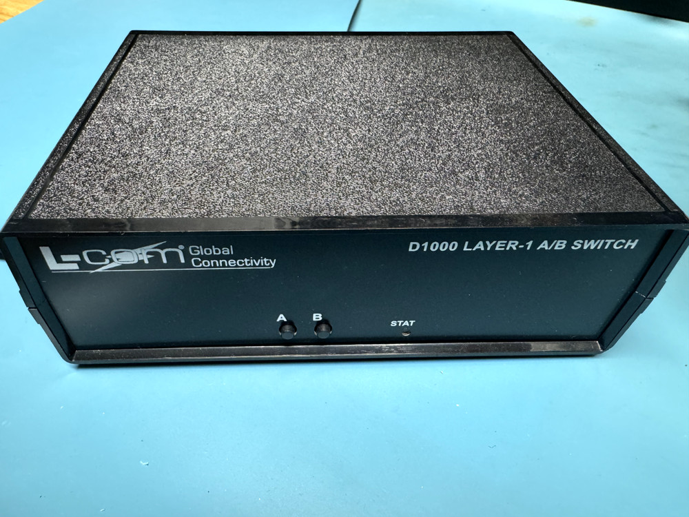 L-COM DB9 D1000 LAYER 1 A/B SWITCH BOX - LATCHING