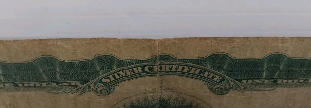 1899 1$ Black Eagle Silver Certificate - Serial# M12110321A (CIRCULATED)