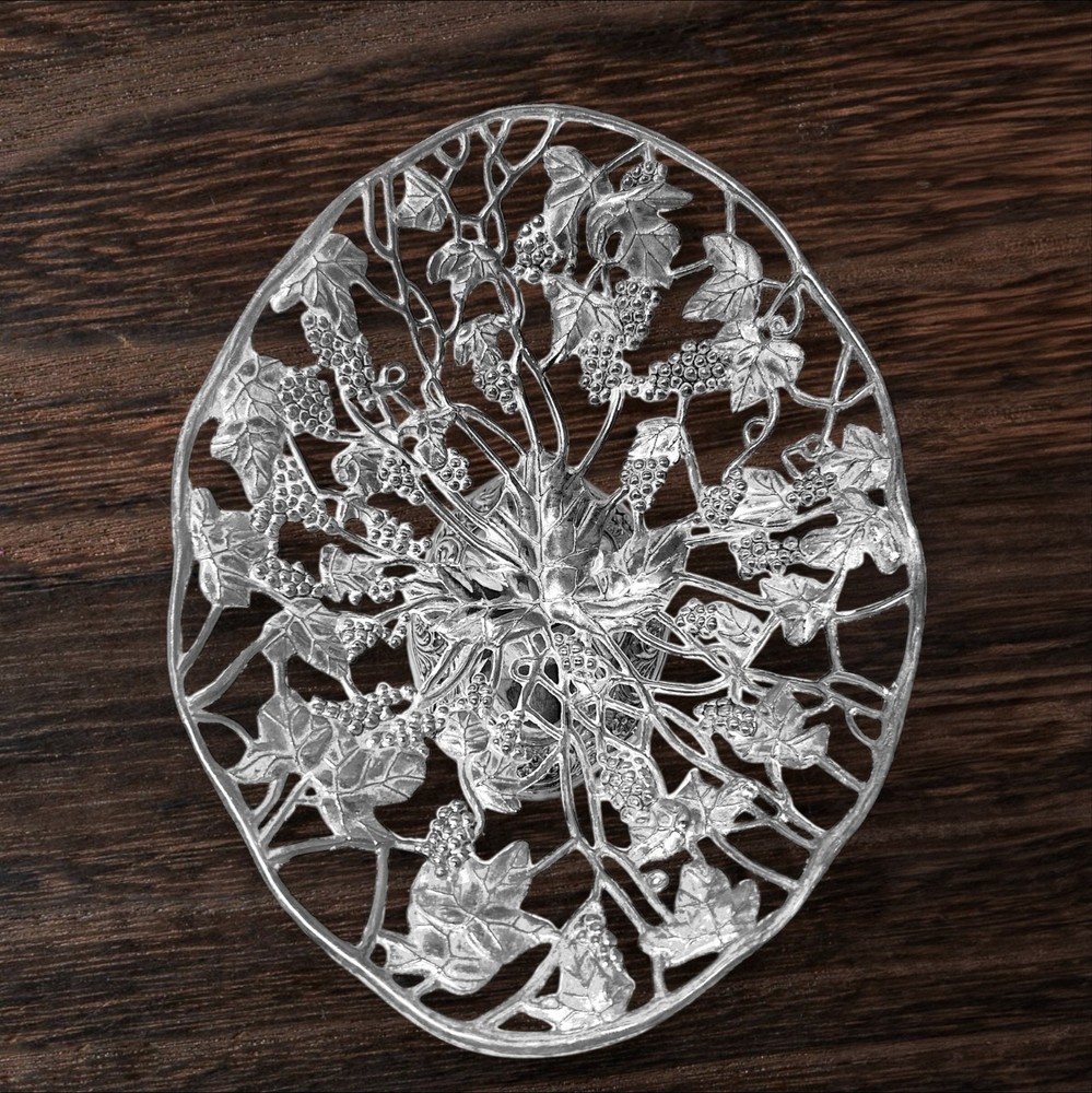 Silver-plated footed centerpiece with intricate grape and vine design